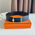 HM OSCAR BELT BUCKLE & REVERSIBLE BLACK AND AEGEAN BLUE LEATHER STRAP 38MM GOLD HARDWARE