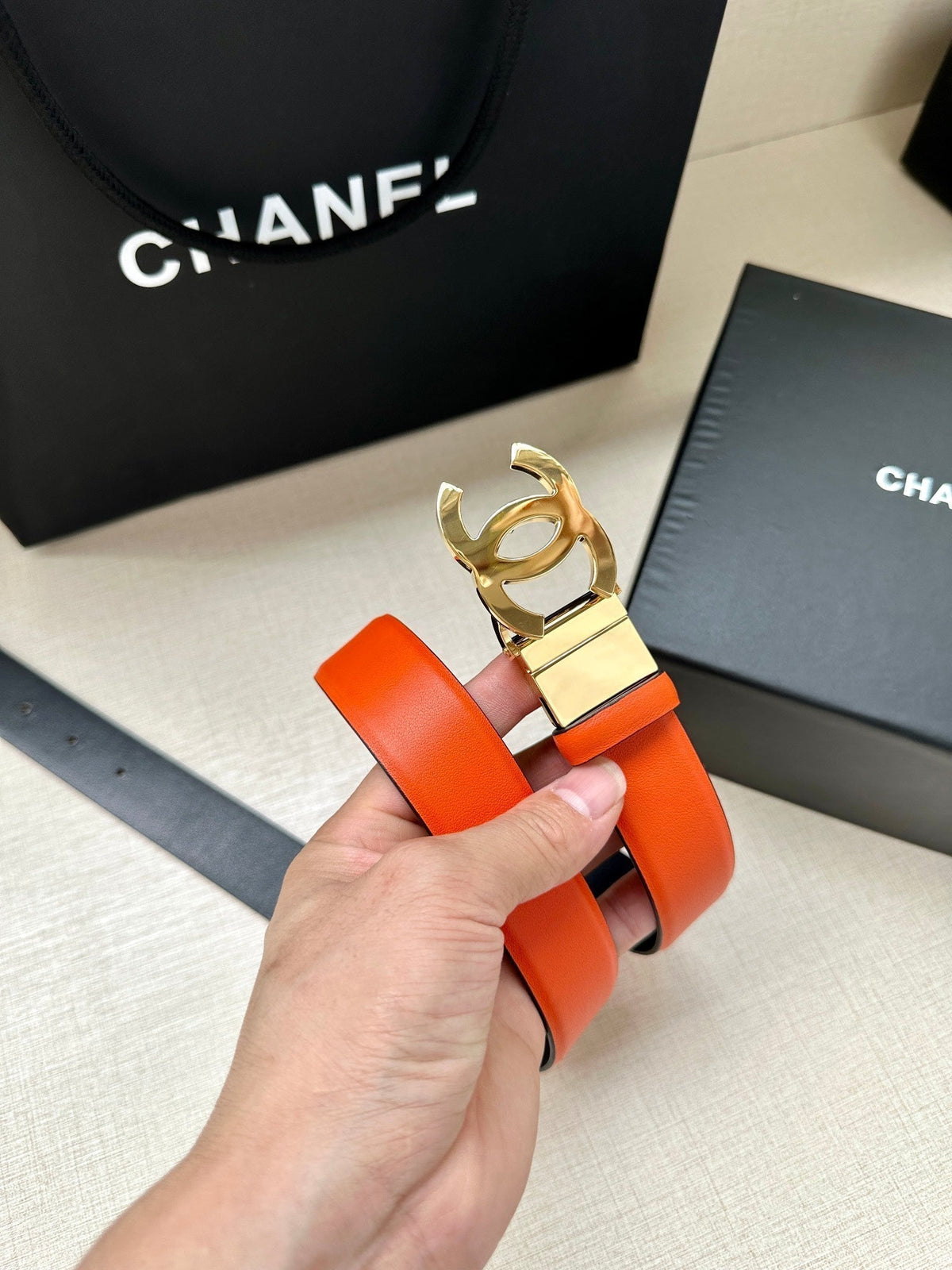 CC 30MM BELT IN FIRE ORANGE AND BLACK CALFSKIN WITH GOLD HARDWARE