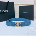 DOUBLE C ELASTIC BELT 30MM IN BLUE DENIM WITH GOLD BUCKLE AND SIDE RHINESTONE DETAILING