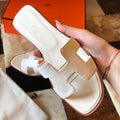HERM Oran Slide Sandals In Beton Epsom Calfskin
