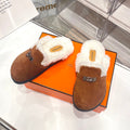SLIP-ON MULE IN UMBER BROWN SUEDE AND SHEARLING LINING