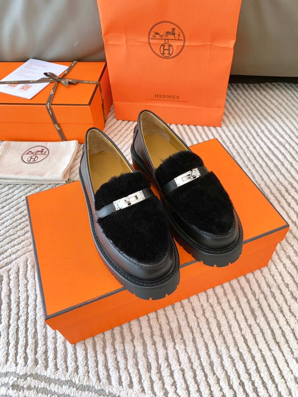 ICONE LOAFER IN BLACK CALFSKIN WITH BLACK SHEARLING